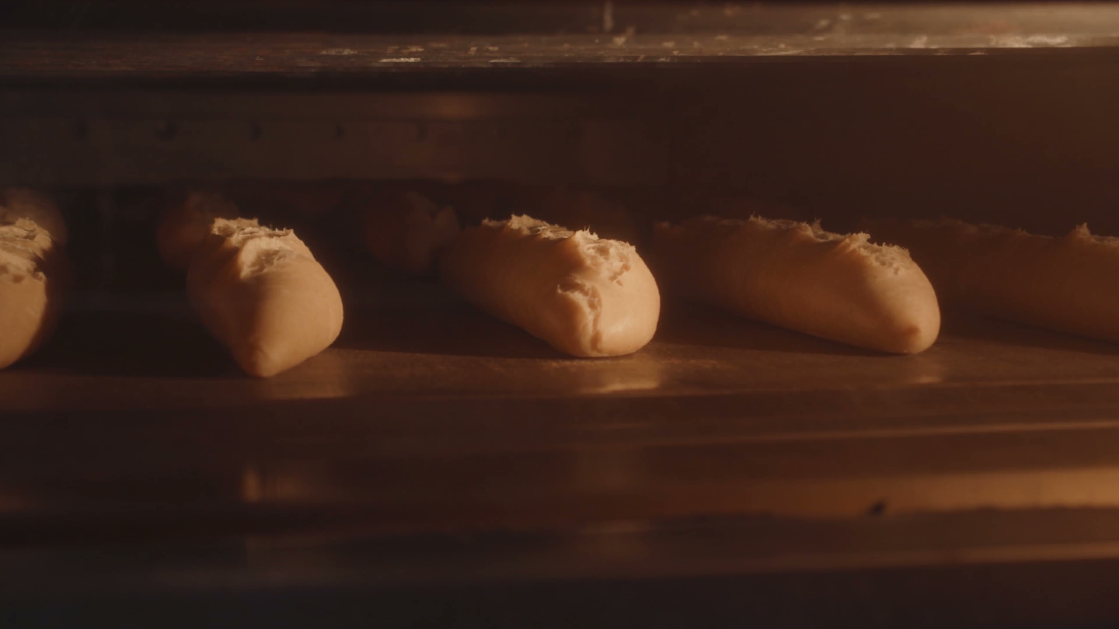 Loaves of bread inside a deck oven