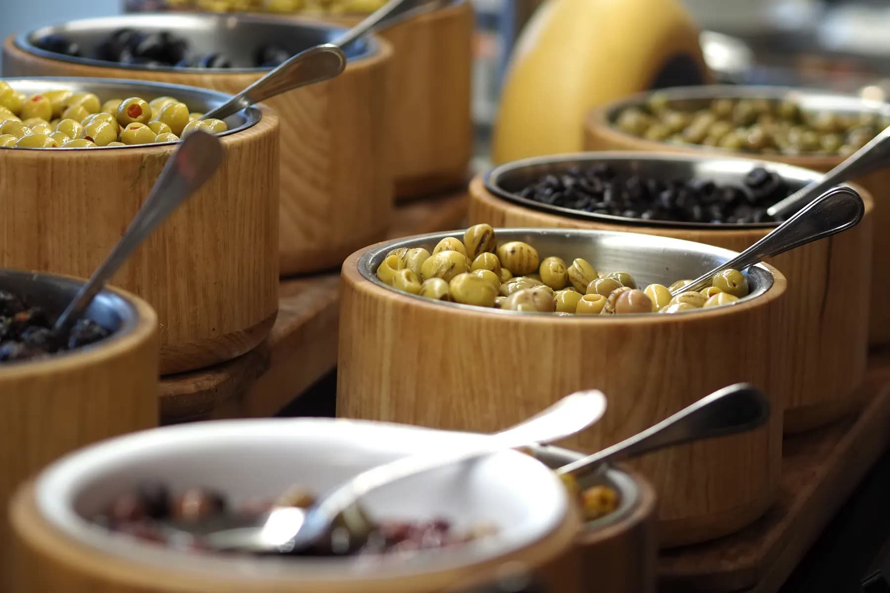Bowls of green and black olives